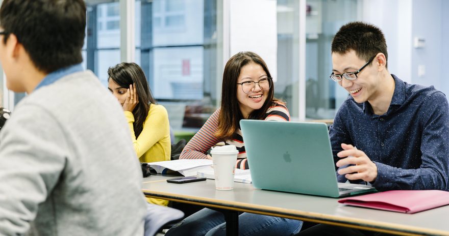 Two students having fun in class