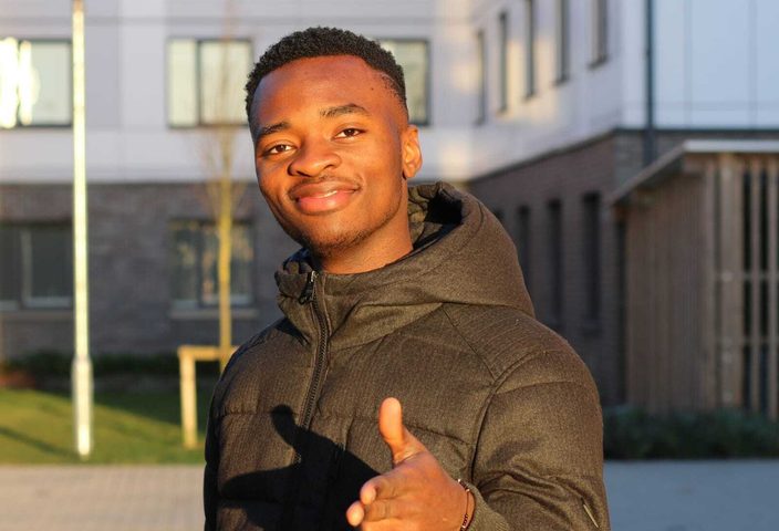 Kayode from Nigeria posing for the camera