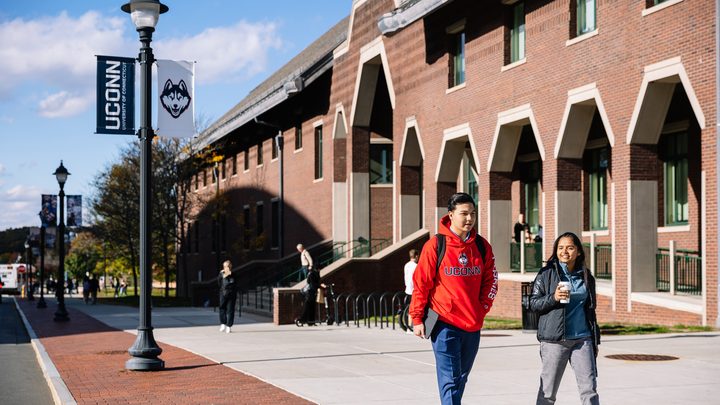 Two UCONN students taking a walk around Storrs Campus