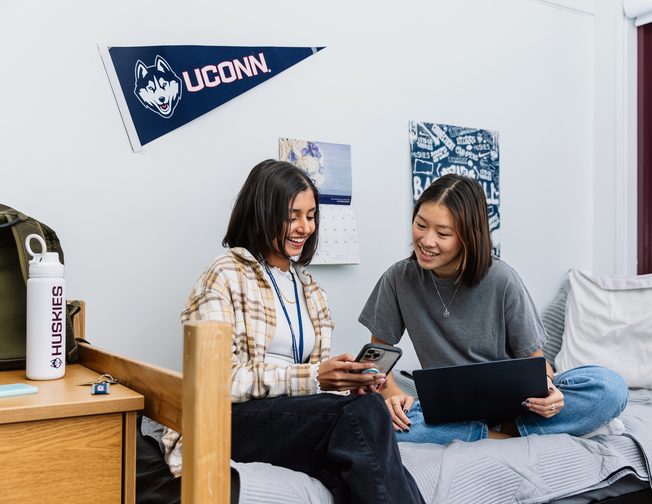 Two UCONN students in their dormitory