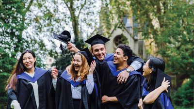 students in graduation gown