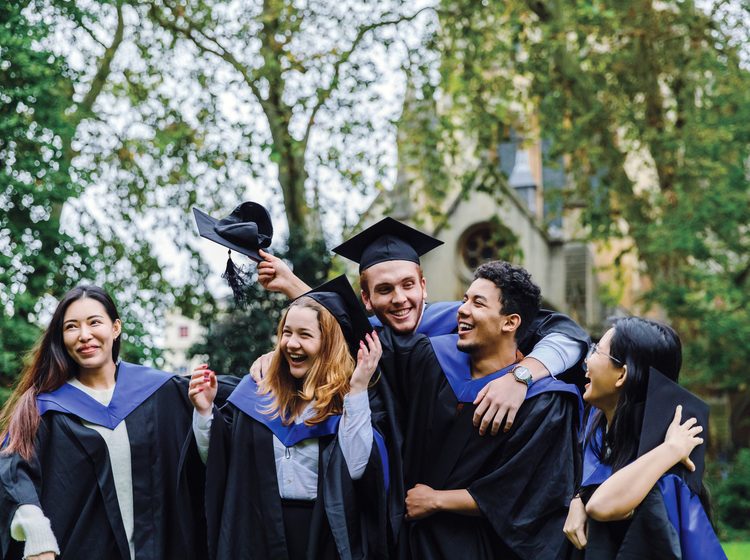 students in graduation gown