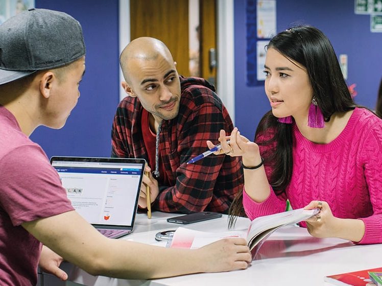 Students studying at a desk