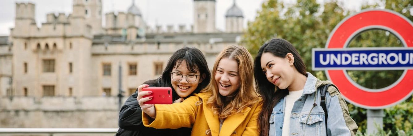 Students taking pictures in London