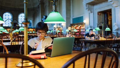 Student in a studying room at boston public library