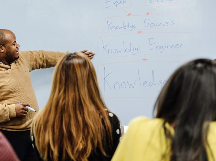 teacher in classroom with students