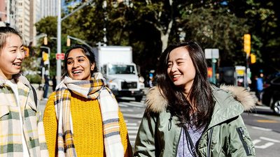 Students walking on a street in USA