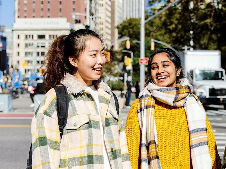 Students walking on a street in USA