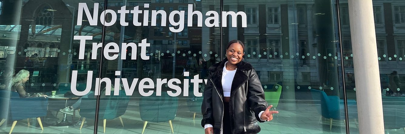 Student ambassador Portio standing outside University