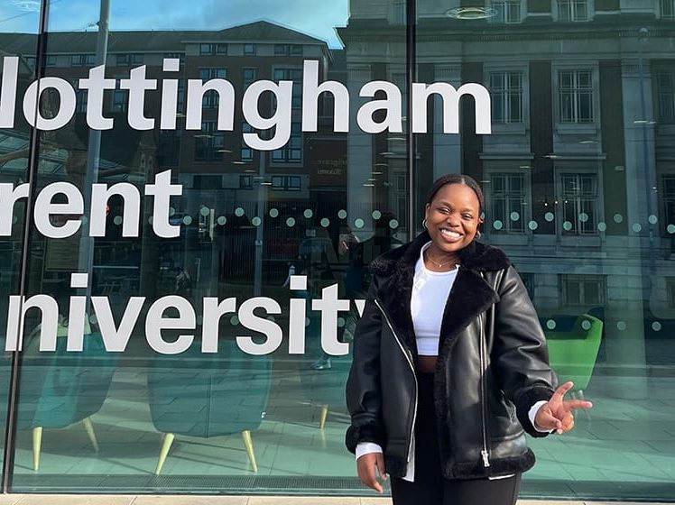 Student ambassador Portio standing outside University