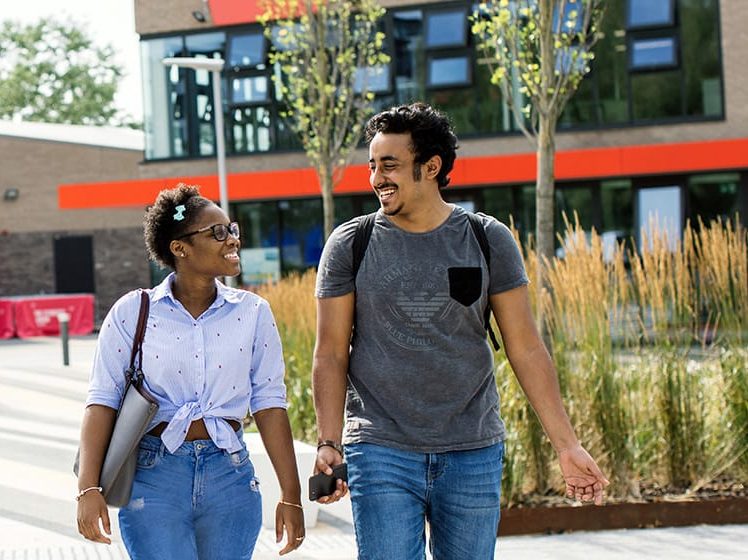 Students walking at UWE Bristol campus