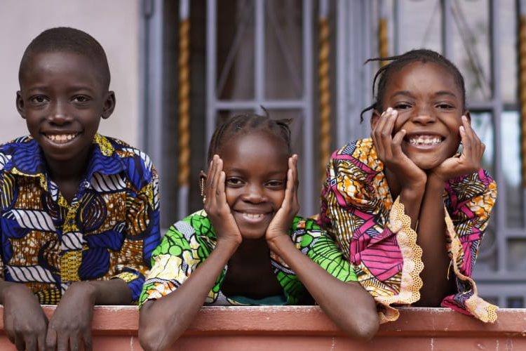 kids cheering up from balcony