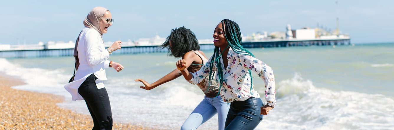 students having fun on beach