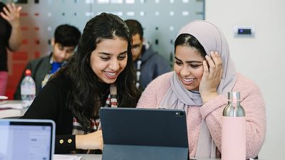 two students on a tablet