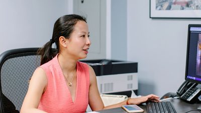 woman using computer