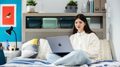 IFP student sitting in classic bedroom at university of bristol accommodation