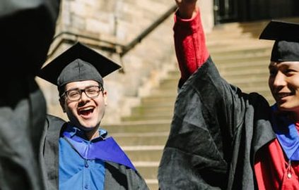 students celebrating their graduation