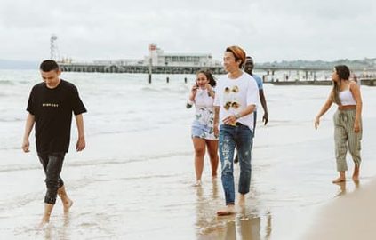 students at Bournemouth beach