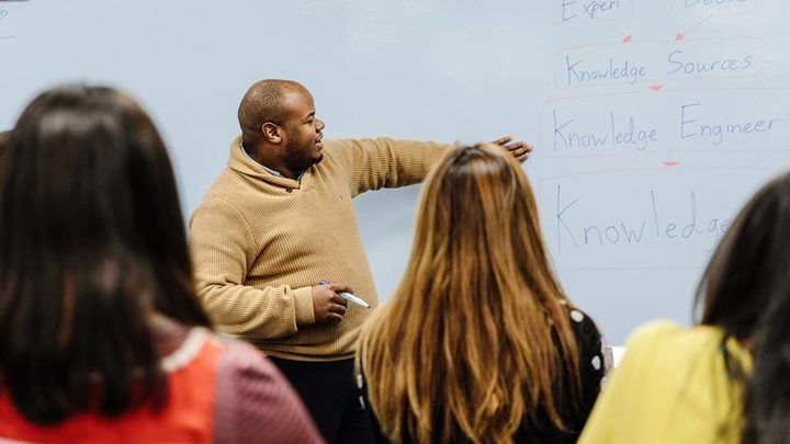 teacher in classroom with students