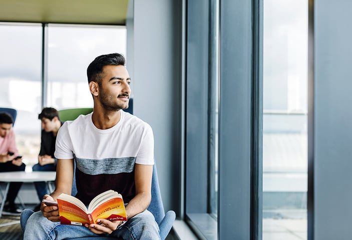 Student reading a book