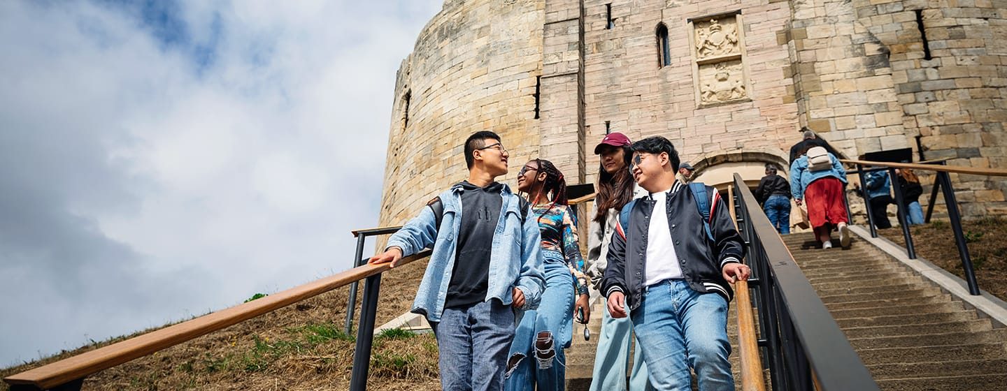 students walking down clifford's tower