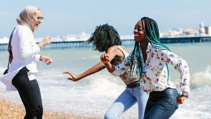 students having fun on beach