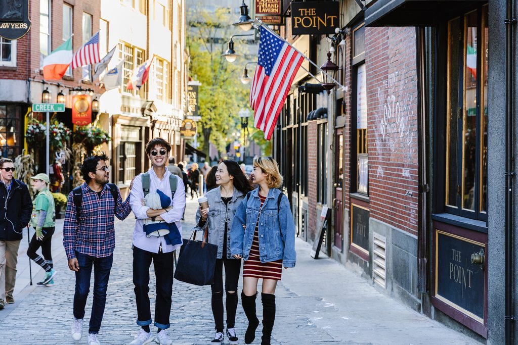 Students walking path the Boston freedom trail