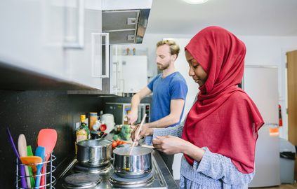 Students cooking in the shared kitchen