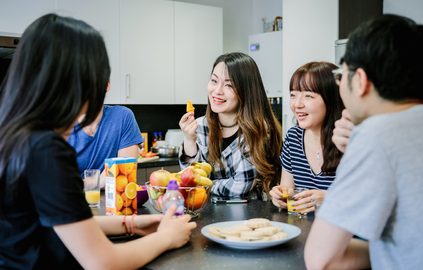 students socialising in the accommodation kitchen