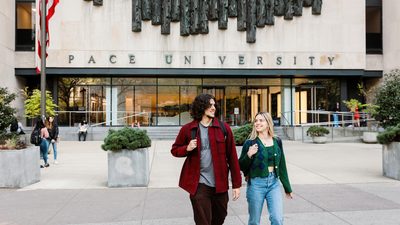 Students in front of Pace University campus building