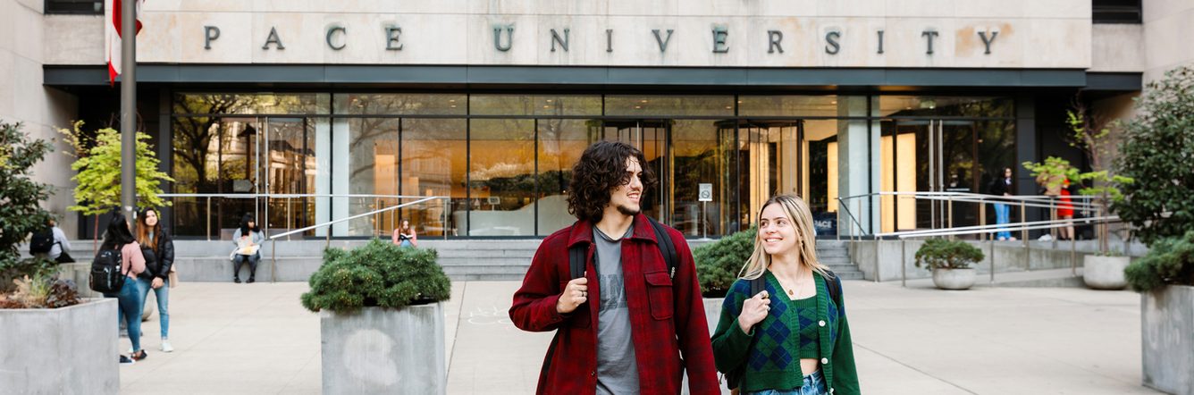Students in front of Pace University campus building