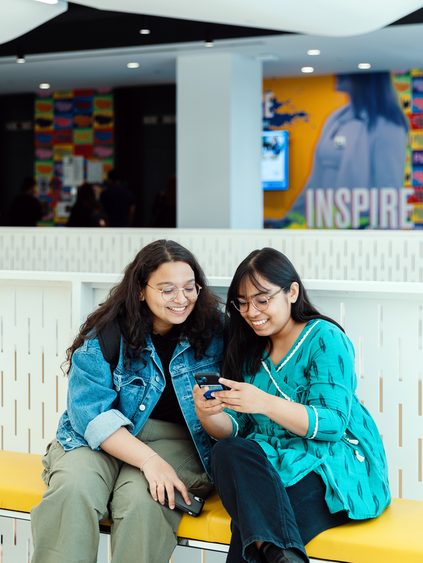 Pace University students socializing on campus