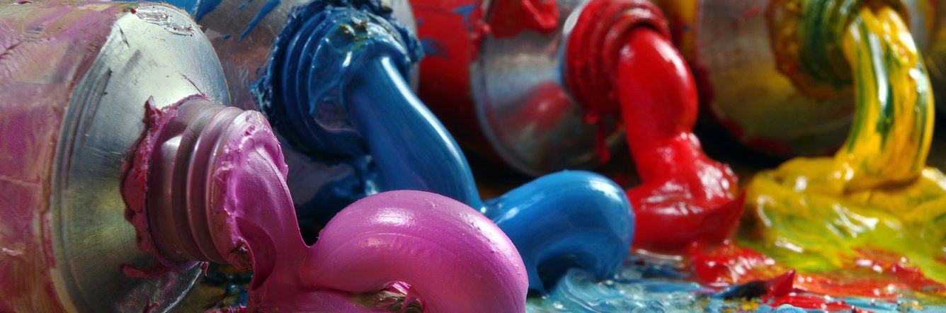 Close up of paints in four different colours