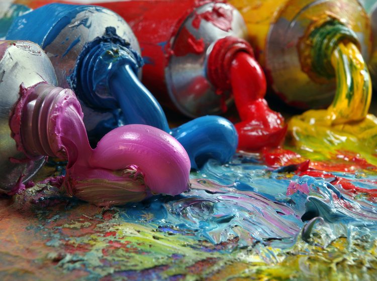 Close up of paints in four different colours
