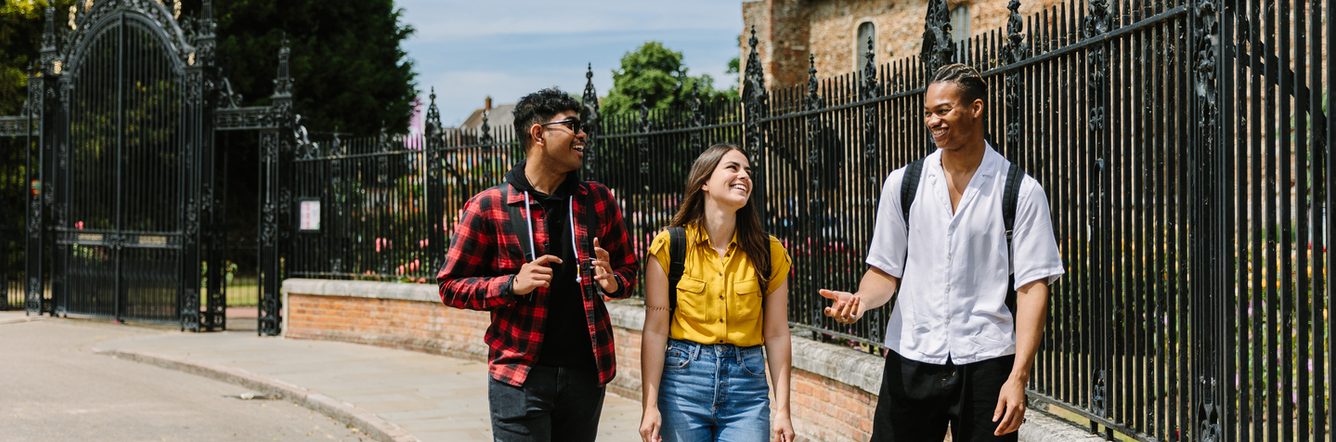 University of Essex students socialising while walking on campus