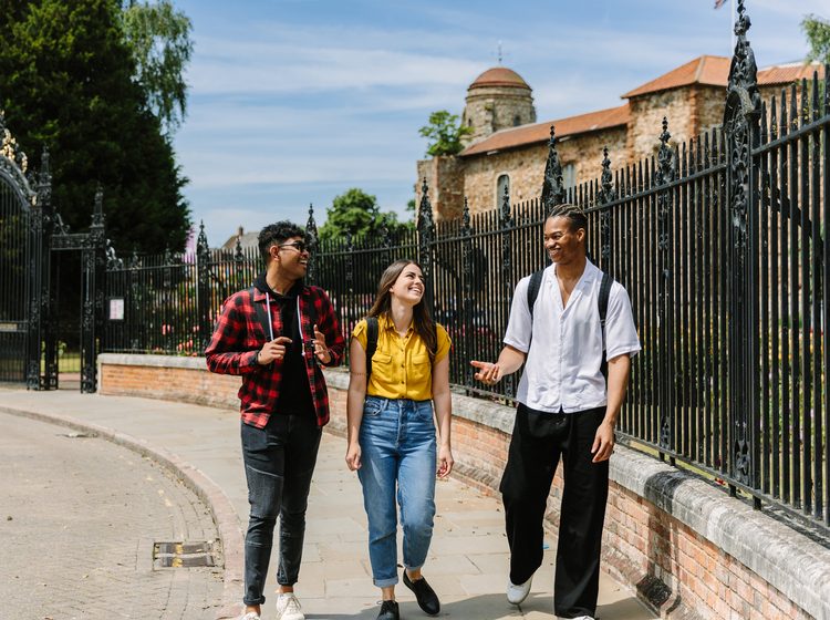 University of Essex students socialising while walking on campus