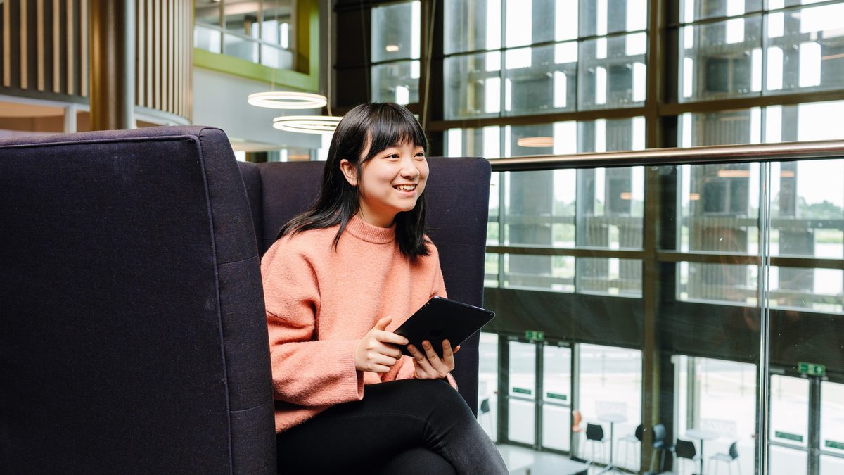 Student sitting at the University of York study area