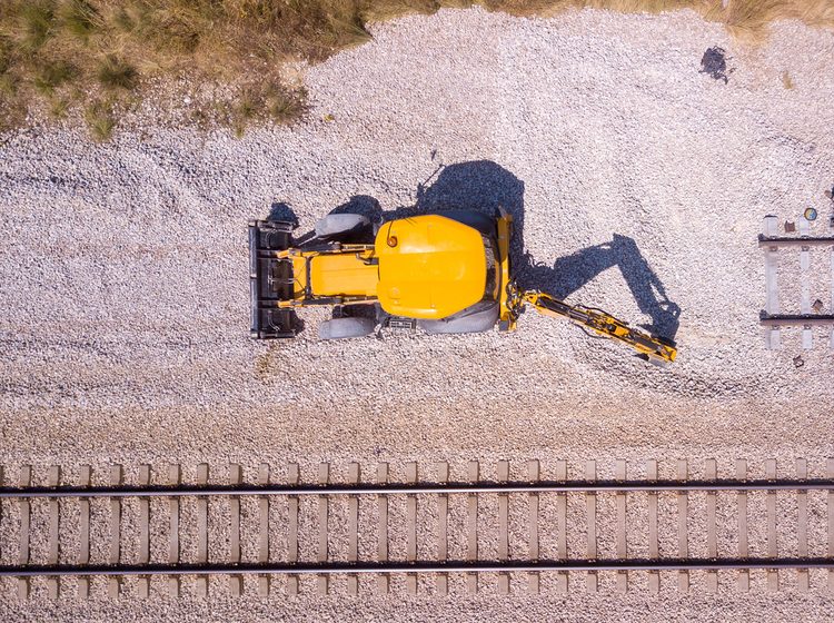 Railway workers repairing a broken track
