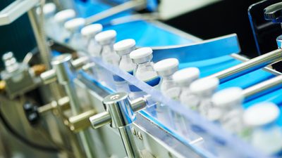 Glass bottles in a conveyor belt