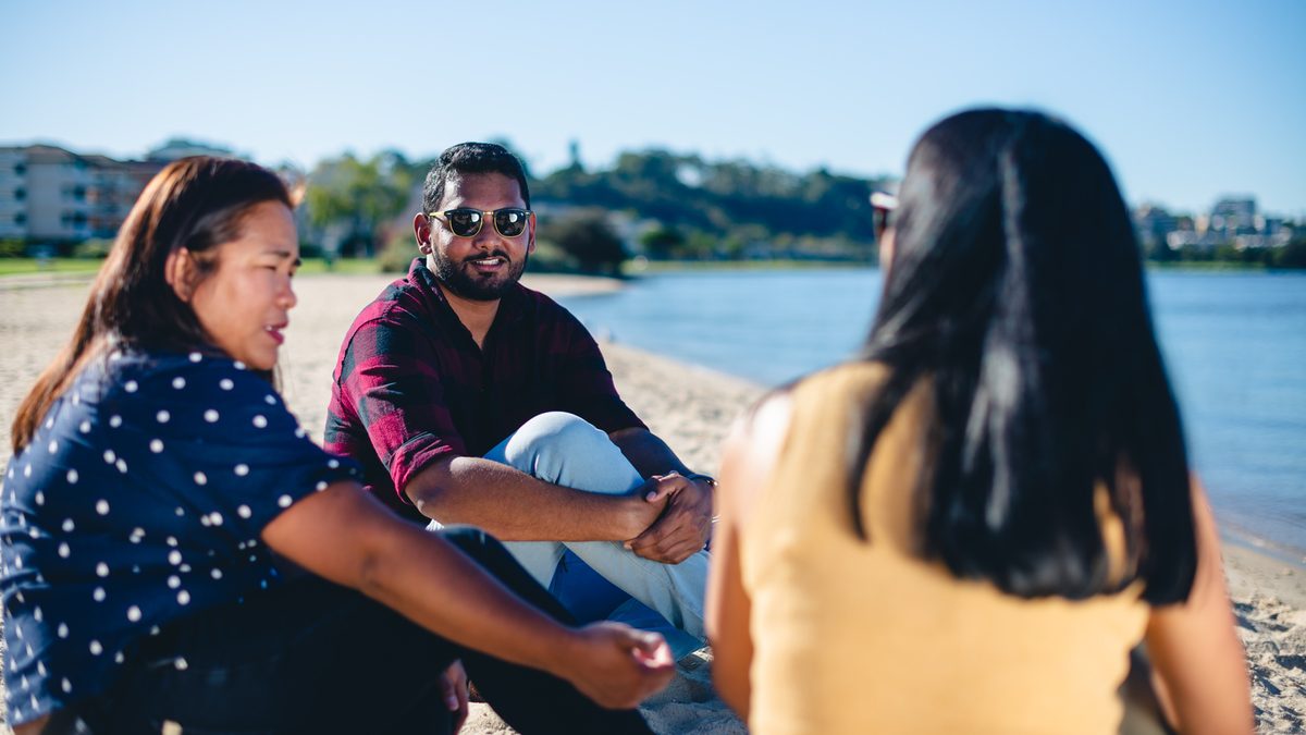 Murdoch University students hanging out at Perth beach