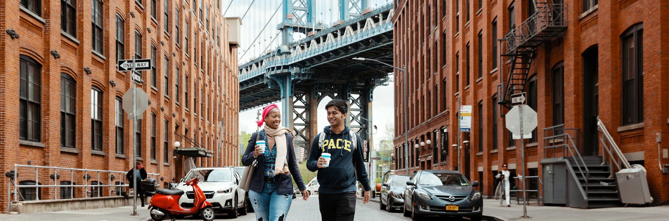 Pace University students walking near Williamsburg bridge