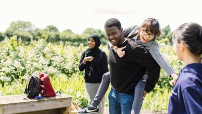 University of Nottingham International College students having fun outside during break