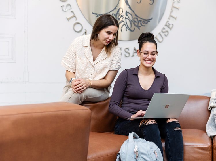 Two Simmons university students collaborating in group work