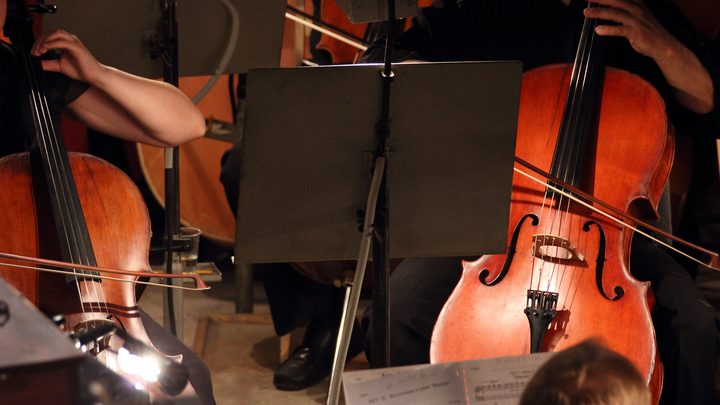 Close up view on two Violoncello in orchestra