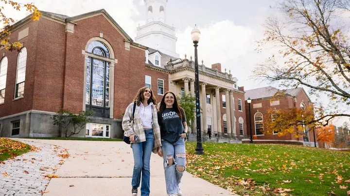 two students walking on campus