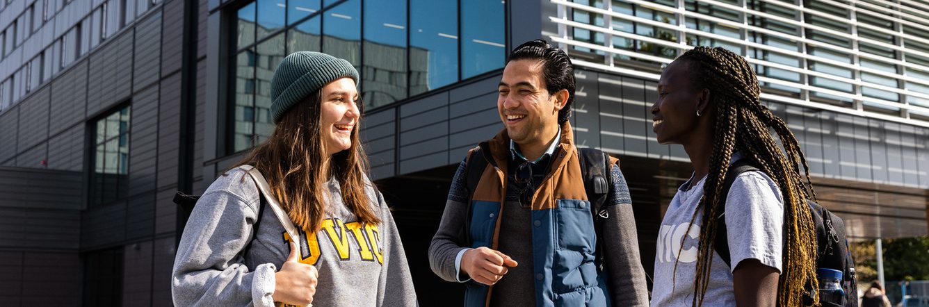 UVic students chatting and laughing