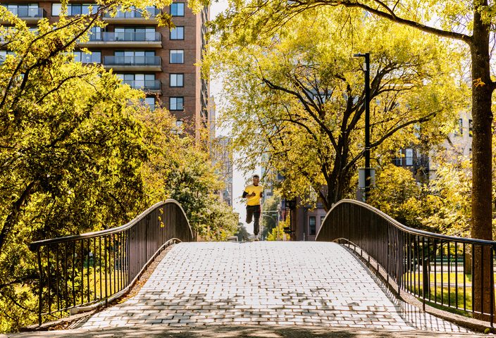 Student running in Boston's back bay park