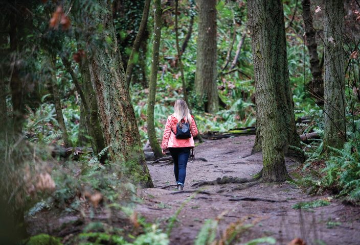 UVic student hiking in nature