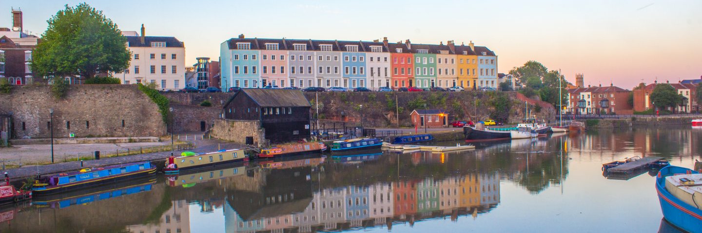 Colourful houses near water in Bristol's harbourside