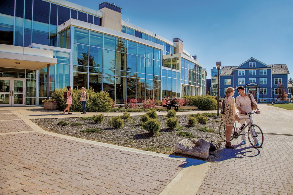 Students socialising outside of U of A campus building
